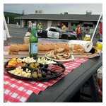 Team Pro-Crass-Duh-Nation always puts on an Italian feast Saturday night, partially seen here atop the roof of their race car